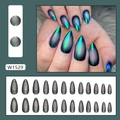 Detailed view of dark green cat eye press-on nails in 24 pieces with almond shape - Green Almond Style (W1529)