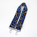 Close-up of blue leopard pattern woven strap with adjustable silver metal buckle - Blue Silver Buckle