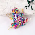 Froschfigur aus Kunstharz mit bunten Muschelfragmenten und Goldblatt-Dekor - Abalone-Muschel