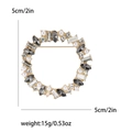 Sparkling crystal wreath brooch with grey marquise gems and pearls, 5cm diameter - White & Black (MM-BR-1785-BK)