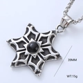 Macro detail of vintage octagonal star pendant with black gemstone, 39mm in height - Vintage Octagonal Star Black Gemstone Style