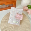 Detail of pink floral fabric book cover with heart button and Suzakka brand tag - Twill Flowers
