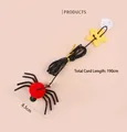 Detail view of the red spider cat toy with elastic string and a transparent suction cup - Spider (Red)