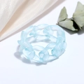 Detail of light blue matte resin chain link ring on silk and dried leaf background - Matte Light Blue