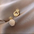 Elegant pineapple pearl earrings with gold leaf details on champagne silk background - Gold Pineapple Stud Earrings