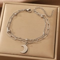 Silver double-layer chain bracelet featuring a polished crescent moon charm and paperclip links - Silver Layered Moon Bracelet (WG-1202)