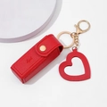 Portable red PU leather lipstick bag keychain with heart pendant and gold metal hardware - Red