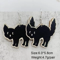 Detail view of black wooden cat earrings for Halloween with size and weight metrics - Wooden Black Cat