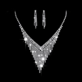 Detailed close-up of sparkling zircon water drop necklace and earring set on black background - TL056/Silver Tassel V-Shape
