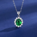 Silver necklace featuring a brilliant green oval emerald pendant with a diamond halo - Tz-42 [matching Chain]
