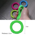 Jouet anneau en silicone pour chien vert et rose avec texture pour nettoyage dentaire - Petits cercles