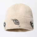 Beige ribbed knit beanie for women with elegant leaf-shaped rhinestone embellishments - One Size / Beige