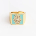Detail of gold Hamsa hand ring with blue enamel and sparkling micro-pave zircons - Adjustable Open / Malachite green