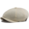 Beige newsboy cap with leather strap and metal button detail, classic cotton design - Milky White