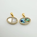 Detailed view of gold oval pendants with natural abalone shell and white mother of pearl - Pig Snout (white Shell)