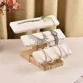 Three-tier solid wood jewelry display stand with white faux leather watch holders - 3-Tier Solid Wood Bracelet Stand-White PU