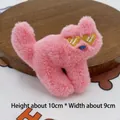 Pink plush cat brooch with yellow heart eyes, measures 10cm x 9cm on a wooden tray - Original Back-opening / Pink