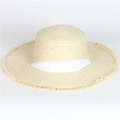 Close-up of the natural straw weaving texture and fringed brim on this summer sun hat - Beige With White Ribbon