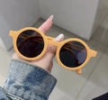 Foldable orange matte round sunglasses for kids with dark lenses in vibrant candy color - Orange