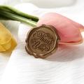 Bronze vintage wax seal stamp with Thank You engraving on white fabric background - Wax Seal (Thank You) / Bronze