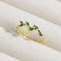 Detailed shot of golden branch ring with marquise emerald stones on beige fabric texture - Natural Branch Shape Green Gemstone (款式3)
