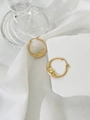 Detailed view of crescent moon face earrings in gold finish with small rhinestone accents - Matte Gold