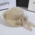 Faltbarer Sonnenhut für Damen mit breiter Krempe und Schleife in hellem Khaki - Beige