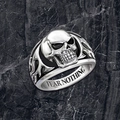 Detail of punk skull ring with Fear Nothing engraving on a black marble background - J073 Skull / Size 13