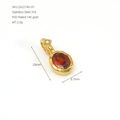 Detailed view of oval red gemstone pendant with size markings and gold plated finish - January Red Rhinestone