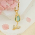 Golden tulip necklace with light blue cat eye stone and cubic zirconia leaf details - Light Blue Cat Eye Necklace / Gold