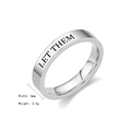 Detailed view of LET THEM engraved silver-tone titanium steel band ring with 4mm width - Size 5 / Silver