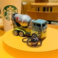 Blue dinosaur cement mixer truck keychain with large silver bell and metal ring - Pull-back Dinosaur Engineering Vehicle - Mixer Truck