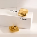 Detail shot of square gold plated earrings with hammered metal texture and 2.1cm dimensions - Wrinkled Square / Gold
