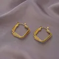 Elegant gold geometric earrings with layered interlocking lines on silk background - Twisted Square Frame / E-065---Gold