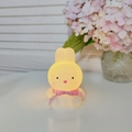Cartoon rabbit night light with pink plaid ribbon emitting soft yellow glowing light - Small Coco Rabbit - Pink Ribbon