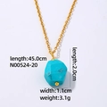 Gold chain necklace featuring an irregular turquoise stone pendant with measurements - Gold + Blue Turquoise