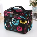 Large black satin cosmetic bag with rose floral print and sturdy handle for travel storage - Blue Rose