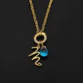 Gold-plated stainless steel initial necklace with blue crystal and heart 'M' pendant - Letter M
