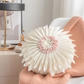 Detail of pink and white flower-shaped pillow on white chair with pink knit blanket - Standard White Pink Center Round Sunflower (Cover Only) / 18x18 Inch
