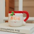 Hand-painted 3D Santa Claus ceramic mug with red handle and holly leaf detail - Short Leaf Santa Mug 400ml