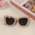 Pink Y2K heart-shaped sunglasses placed on a beige textured background with a book - Pink 13-Nude Pink Wide Rim Cat-eye Style