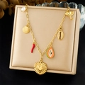 Detail of gold-plated stainless steel charm bracelet with shell and flower charms - Elephant Shell Chili Charm Bracelet Style (N3636)