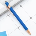 Navy blue retractable stylus ballpoint pen with rose gold accents on a grid desk pad - Sapphire Blue
