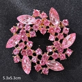 Pink rhinestone flower brooch in 5.3x5.3cm size with elegant golden alloy base - Rotating Pink Crystal Flower