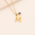 Collier en acier inoxydable doré avec lettre initiale M et breloque œil bleu - M