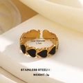 18K gold plated stainless steel open ring featuring black enamel heart patterns - Wide Surface Black Hearts (943G-4)