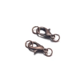 Close-up of vintage bronze lobster clasps and jump rings for DIY jewelry making - Antique Red Copper