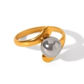 Detailed view of an open golden steel ring featuring a large grey round pearl accent - Rounded Cross Inlaid Large Bead Style (HC-R30366)