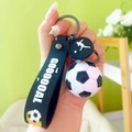Soccer keychain with black silicone GOOO0OAL strap and white football figure charm - Black & White