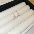 Minimalist pearl stud earrings with white round pearls and gold needles on white fabric - 3# Silver Earring Post - Gold - White - 10mm Pearl